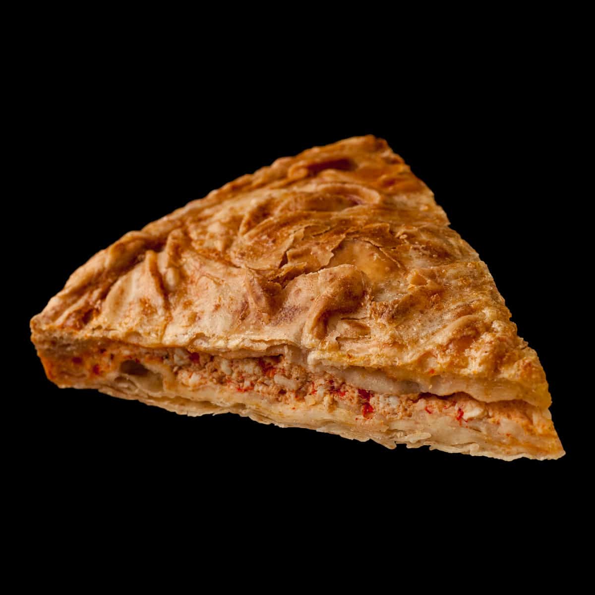 A slice of smoked cheese & smoked pepper filo pie (Kapnisti tyropita)